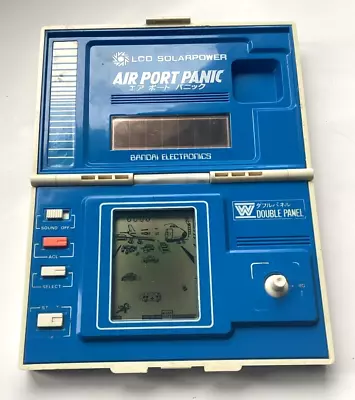 Buy Vintage 1984 BANDAI - AIRPORT - Clamshell Solar LCD Game (Very Good Condition) • 40£