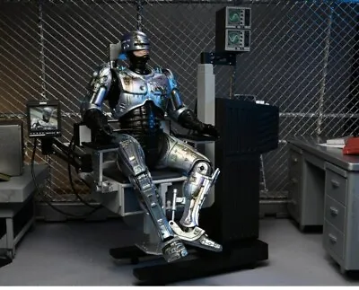 Buy Neca Robocop - Battle-Damaged RoboCop With Chair 7  Scale Action Figure  • 79.99£