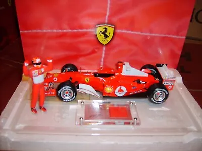 Buy 1:18 Formula 1 - MICHAEL SCHUMACHER F1 RACE SUIT FERRARI F2004 - Limited Edition • 280£