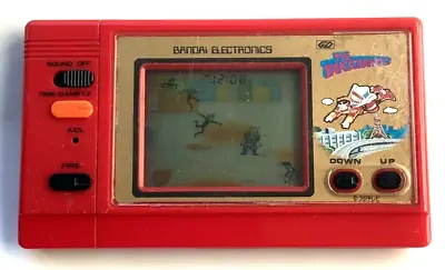 Buy Vintage 1982 RARE GD BANDAI - THE TAKECHAN MAN - LCD GAME (Very Good Condition) • 50£