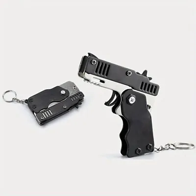 Buy 2 X RUBBER BAND GUNS KEYCHAIN + 60 Bands Per Toy Gun - Great Party Bag Filler! • 6.99£