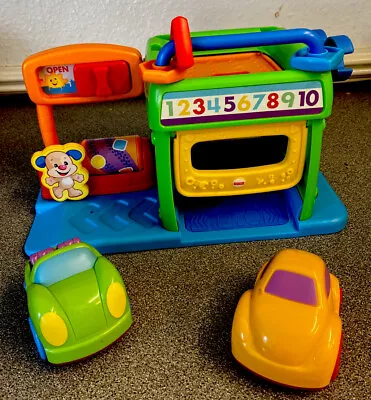 Buy Fisher Price Small Garage With Sounds And Two Cars • 4£