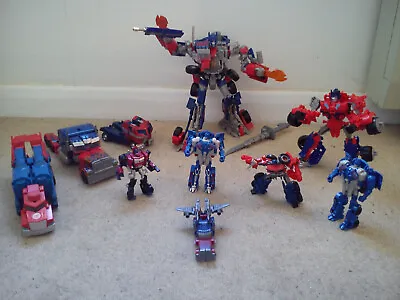 Buy Hasbro Optimus Prime Toy Bundle - All Sizes Leader Class, Voyager, Movie,scout.  • 89.95£