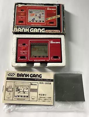 Buy Vintage 1982 RARE GD BANDAI - BANK GANG - LCD GAME (Near Mint Condition) • 65£
