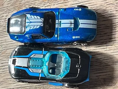 Buy Two Hot Wheel Cars, One Forza Horizon Car And One Blue And Black Hot Wheel. • 4.80£