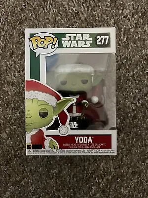 Buy Funko Pop Bobble: Star Wars - Holiday Santa Yoda (33885) • 10£