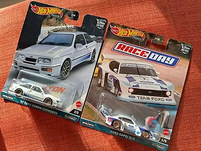 Buy 2 X Hot Wheels Cars RACE DAY FORD CAPRI & FORD SIERRA COSWORTH CANOY WARRIORS  • 20£
