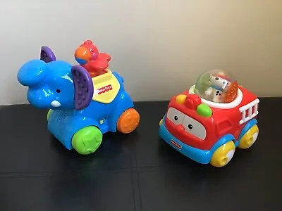 Buy Fisher Price Elephant Animal Sounds And A Roll Around Push Along Fire Engine • 7.50£