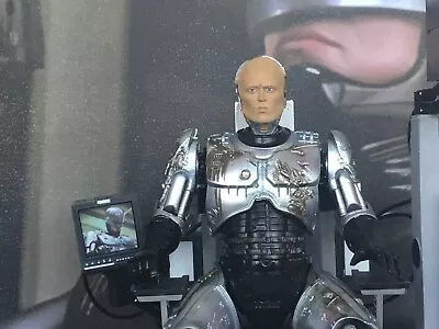 Buy NECA Ultimate Battle Damaged Robocop With Chair • 85£