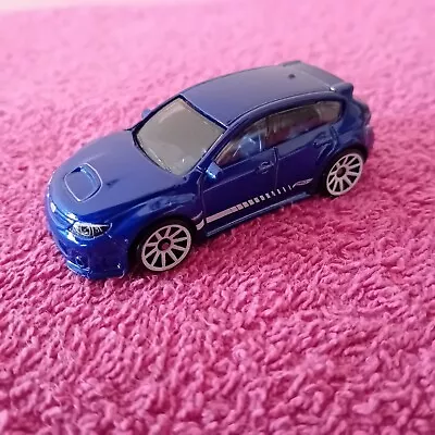 Buy Hot Wheels Unboxed - Subaru WRX STi - Metallic Blue • 1.50£